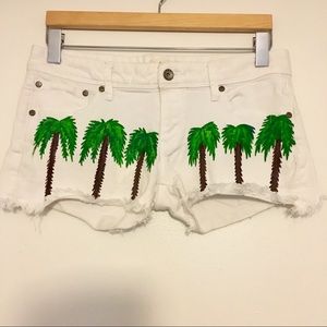 Rad hand-painted palm tree peace cutoff shorts
